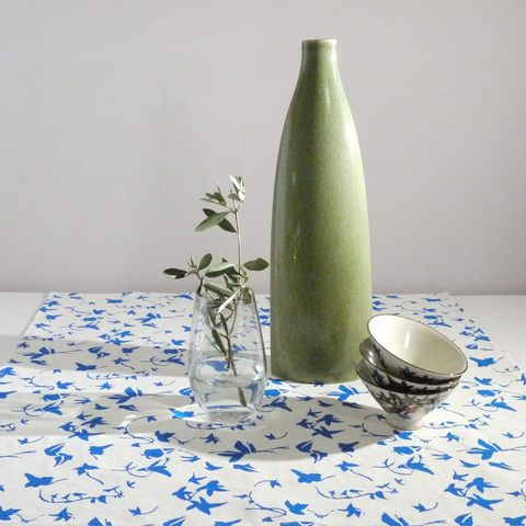 Table topper in linen with screen printed ivy design, washable 70 x 70cm hemmed. Created and made by Curious Lions in the UK.