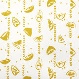 Table topper in linen with screen printed lemons design, washable 70 x 70cm hemmed. Created and made by Curious Lions in the UK.